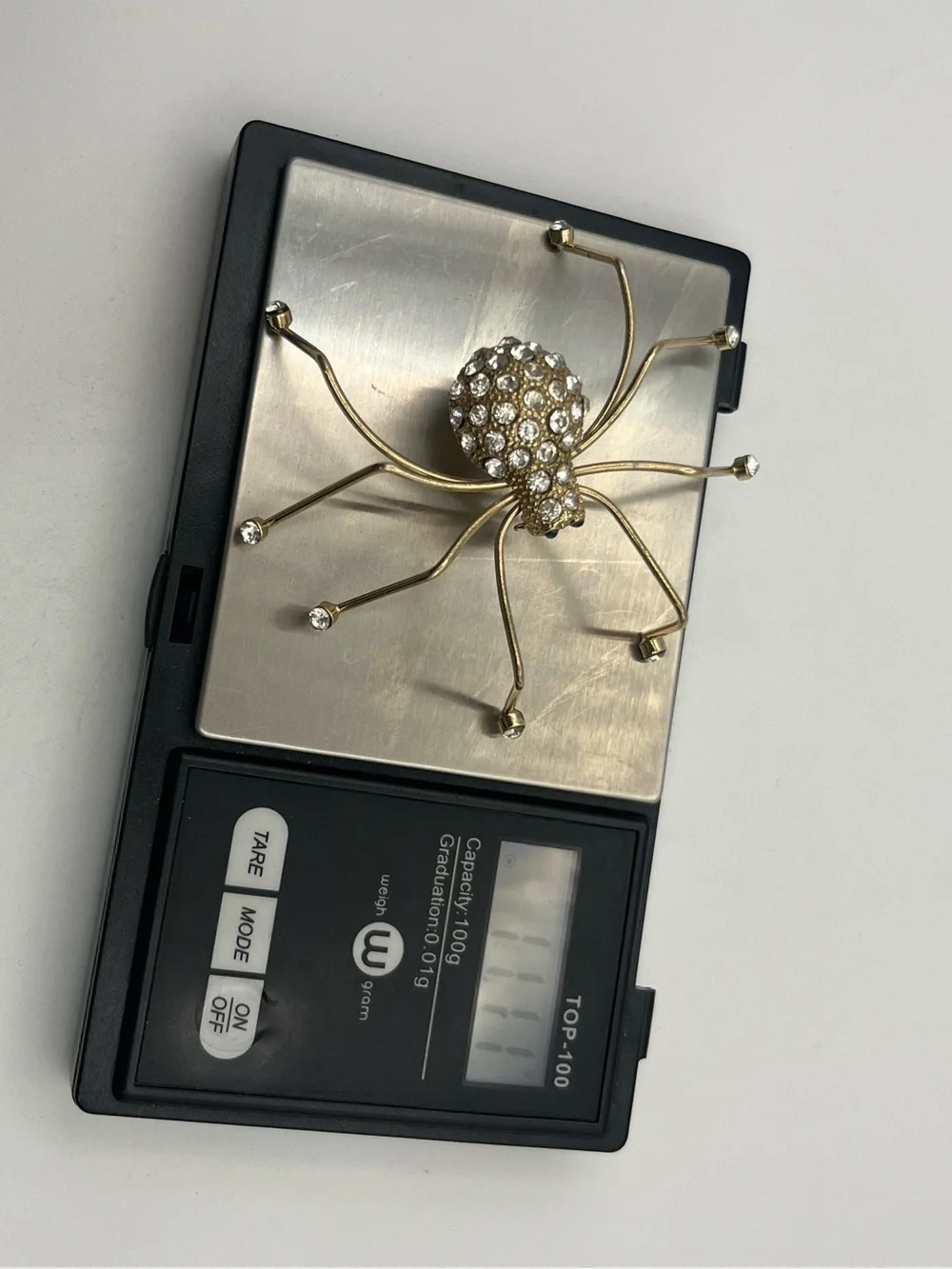 Spider insect gold tone clear rhinestone brooch pin